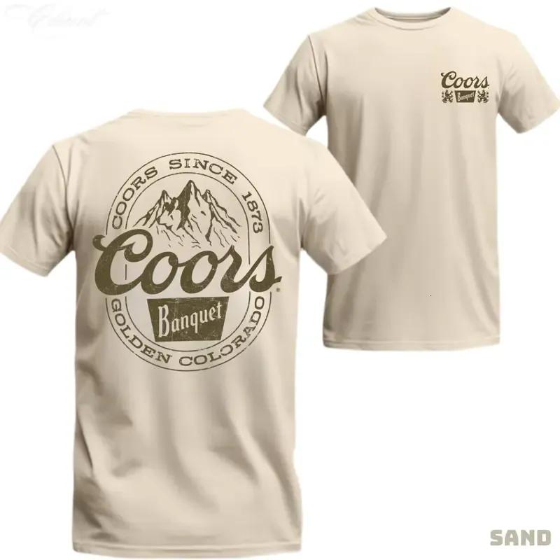 Coors Banquet T-Shirt – Featuring a vintage Coors logo and a mountainous backdrop, this classic T-shirt celebrates Coors since 1873. Perfect for beer lovers. Unisex. Tops Menswear
